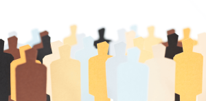 Building a Strong Team - paper cut-outs of lots of people in different colours