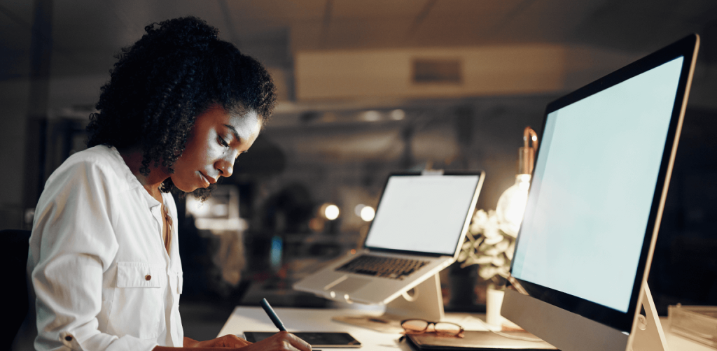 Marketing and Sales Administration - women sitting in front on a computer